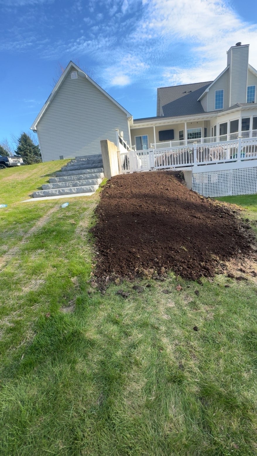 Graded and prepped slope for new lawn installation